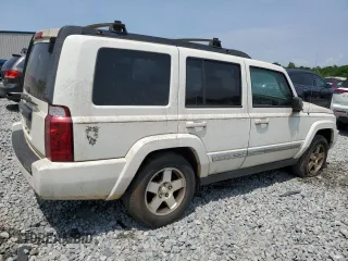 2010 Jeep Commander Sport with VIN 1J4RH4GK0AC103539, listed as a Copart auction lot 54136675 with 243,238 mi miles and Clean Title. Bid and sale history available at carsss.com. Image 3.