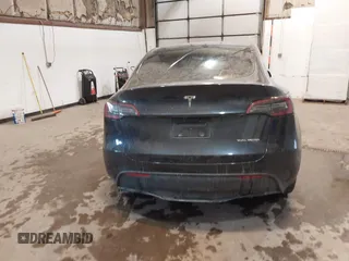 2024 Tesla Model Y Long Range with VIN 7SAYGDEE0RA282634, listed as a IAAI auction lot 41627510 with 23,054 mi miles and . Bid and sale history available at DreamBid. Image 17.