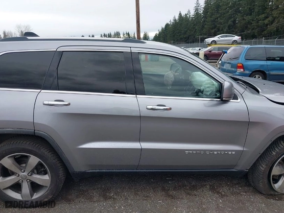 2014 Jeep Grand Cherokee Limited with VIN 1C4RJFBG8EC541921, listed as a IAAI auction lot 41903574 with 133,679 mi miles. Bid and sale history available at carsss.com. Image 14.