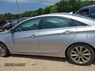 2012 Hyundai Sonata Limited z VIN 5NPEC4AC9CH354782, wystawiony jako IAAI lot #42416670 z przebiegiem 131 636 mil mil oraz . Historia ofert i sprzedaży dostępna na DreamBid. Obrazek 14.