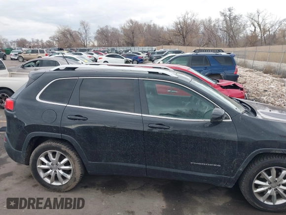 2014 Jeep Cherokee Limited with VIN 1C4PJLDS7EW283526, listed as a IAAI auction lot 41718517 with 129,868 mi miles. Bid and sale history available at carsss.com. Image 13.