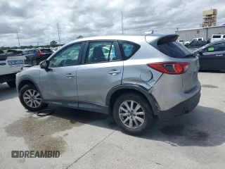 2014 Mazda CX-5 Sport with VIN JM3KE2BE1E0402185, listed as a Copart auction lot 52313675 with 140,398 mi miles and Salvage Title. Bid and sale history available at carsss.com. Image 2.