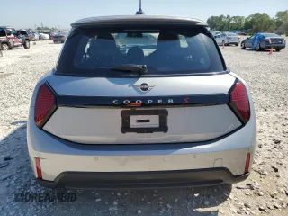 2025 MINI Hardtop Cooper S with VIN WMW23GD00S2W74060, listed as a Copart auction lot 52106175 with 410 mi miles and Salvage Title. Bid and sale history available at DreamBid. Image 6.