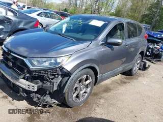 2017 Honda CR-V EX with VIN 2HKRW2H5XHH678674, listed as a IAAI auction lot 42039505 with 124,891 mi miles. Bid and sale history available at carsss.com. Image 2.