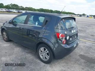 2014 Chevrolet Sonic LT with VIN 1G1JC6SB2E4115463, listed as a IAAI auction lot 42106600 with 135,652 mi miles. Bid and sale history available at carsss.com. Image 3.