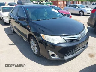 2014 Toyota Camry L with VIN 4T4BF1FK3ER413537, listed as a IAAI auction lot 42015577 with 181,592 mi miles. Bid and sale history available at carsss.com. Image 1.