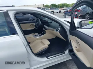 2025 BMW 3 Series 330i with VIN 3MW69CW0XS8F32371, listed as a IAAI auction lot 42630553 with 11,417 mi miles and . Bid and sale history available at DreamBid. Image 5.