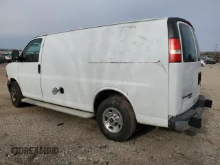 2014 GMC Savana Cargo Van with VIN 1GTW7FCAXE1909748, listed as a Copart auction lot 87214754 with 263,944 mi miles and Salvage Title. Bid and sale history available at carsss.com. Image 2.