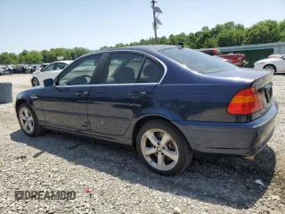 2004 BMW 3 Series 330xi with VIN WBAEW53434PN32840, listed as a Copart auction lot 57252165 with 213,458 mi miles and Clean title. Bid and sale history available at DreamBid. Image 2.