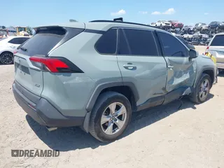 2020 Toyota RAV4 XLE with VIN 2T3W1RFV0LW069849, listed as a IAAI auction lot 42138074 with 112,062 mi miles and . Bid and sale history available at DreamBid. Image 4.
