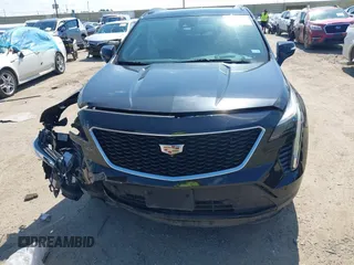 2019 Cadillac XT4 FWD Sport with VIN 1GYFZER46KF125100, listed as a IAAI auction lot 42221290 with 79,491 mi miles and . Bid and sale history available at DreamBid. Image 12.