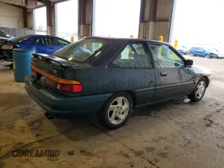 1996 Ford Escort z VIN 1FASP11J0TW123967, wystawiony jako Copart lot #52859835 z przebiegiem 164 693 mil mil oraz Szkoda całkowita • Salvage title. Historia ofert i sprzedaży dostępna na DreamBid. Obrazek 3.