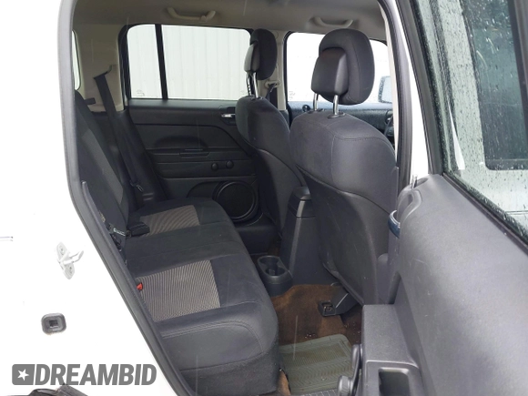 2013 Jeep Patriot Sport with VIN 1C4NJPBA8DD223029, listed as a IAAI auction lot 41765589 with 164,590 mi miles. Bid and sale history available at carsss.com. Image 8.