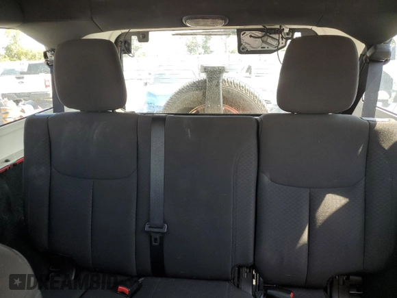 2015 Jeep Wrangler Unlimited Willys Wheeler with VIN 1C4BJWDG3FL726460, listed as a Copart auction lot 55827355 with 96,482 mi miles and Salvage Title. Bid and sale history available at DreamBid. Image 10.
