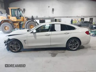 2019 BMW 4 Series 440i xDrive with VIN WBA4J7C5XKBM76209, listed as a IAAI auction lot 42071170 with 62,460 mi miles and . Bid and sale history available at carsss.com. Image 14.