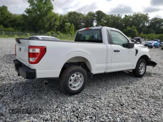 2022 Ford F-150 XL with VIN 1FTMF1CB1NKE65448, listed as a Copart auction lot 60610254 with 9,587 mi miles and Salvage Title. Bid and sale history available at carsss.com. Image 3.