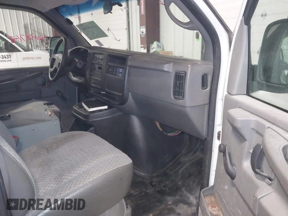 2004 Chevrolet Express Cargo Van with VIN 1GCGG25U641135906, listed as a IAAI auction lot 42038768 with 129,677 mi miles. Bid and sale history available at carsss.com. Image 5.