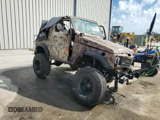 1988 Suzuki Samurai z VIN JS4JC51C6J4271251, wystawiony jako Copart lot #44574795 z przebiegiem 14 542 mil mil oraz Szkody całkowita. Historia ofert i sprzedaży dostępna na DreamBid. Obrazek 4.