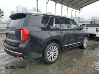 2023 GMC Yukon Denali with VIN 1GKS1DKL8PR402542, listed as a Copart auction lot 42001695 with 23,497 mi miles and Salvage Title. Bid and sale history available at carsss.com. Image 3.