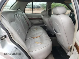 1999 Mercury Grand Marquis LS z VIN 2MEFM75W3XX617388, wystawiony jako Copart lot #58811195 z przebiegiem 162 600 mil mil oraz Szkoda całkowita • Salvage title. Historia ofert i sprzedaży dostępna na DreamBid. Obrazek 10.