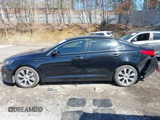 2013 Kia Optima SX with VIN 5XXGR4A65DG186542, listed as a IAAI auction lot 41824914 with 205,582 mi miles and . Bid and sale history available at DreamBid. Image 14.