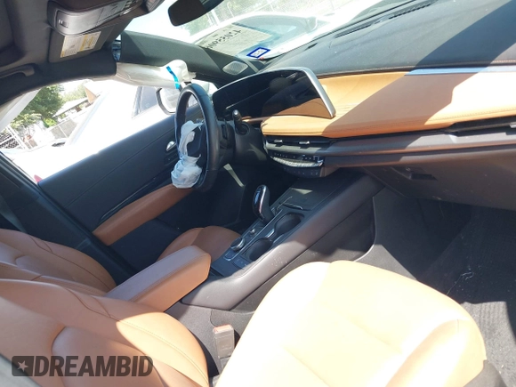 2024 Cadillac XT4 FWD Sport with VIN 1GYFZER43RF133293, listed as a IAAI auction lot 42055906 with 25,398 mi miles and . Bid and sale history available at DreamBid. Image 5.