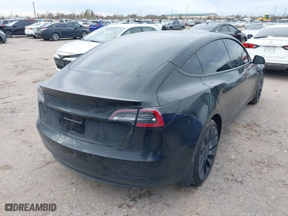 2021 Tesla Model 3 Performance with VIN 5YJ3E1EC0MF925439, listed as a IAAI auction lot 41363769 with 60,503 mi miles. Bid and sale history available at carsss.com. Image 4.