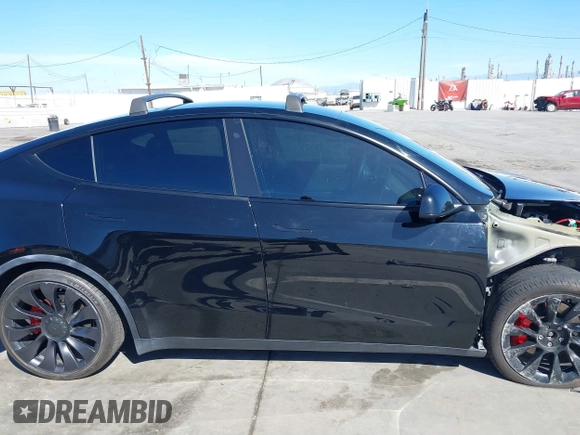 2021 Tesla Model Y Performance with VIN 5YJYGDEF9MF251738, listed as a IAAI auction lot 41708950 with 61,248 mi miles and . Bid and sale history available at DreamBid. Image 14.