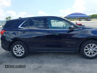 2020 Chevrolet Equinox LT with VIN 3GNAXJEV5LS592266, listed as a IAAI auction lot 41924328 with 61,574 mi miles and . Bid and sale history available at DreamBid. Image 13.