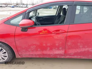 2015 Honda Fit LX z VIN 3HGGK5H54FM728448, wystawiony jako IAAI lot #41538650 z przebiegiem 115 450 mil mil oraz . Historia ofert i sprzedaży dostępna na DreamBid. Obrazek 14.