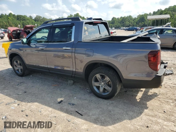2022 Honda Ridgeline RTL-E with VIN 5FPYK3F72NB000908, listed as a Copart auction lot 65631535 with 35,796 mi miles and Salvage title. Bid and sale history available at DreamBid. Image 2.