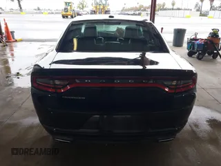 2020 Dodge Charger SXT with VIN 2C3CDXBG0LH211627, listed as a IAAI auction lot 41793868 with 104,587 mi miles and . Bid and sale history available at DreamBid. Image 16.
