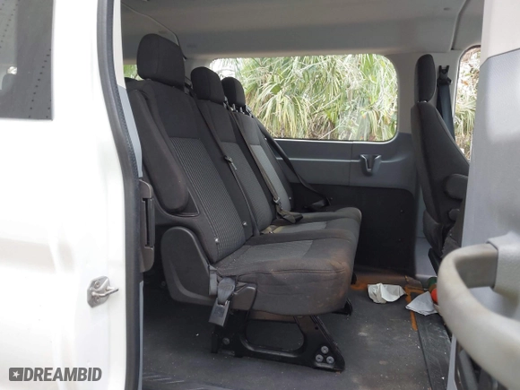 2016 Ford Transit Wagon XL with VIN 1FBZX2ZM8GKA44044, listed as a IAAI auction lot 40774606 with 57,176 mi miles. Bid and sale history available at carsss.com. Image 8.
