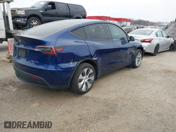 2024 Tesla Model Y Long Range with VIN 7SAYGDEE9RA269882, listed as a IAAI auction lot 41771485 with 18,145 mi miles. Bid and sale history available at carsss.com. Image 4.