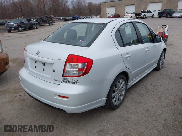 2012 Suzuki SX4 with VIN JS2YC5A52C6300339, listed as a IAAI auction lot 41829263 with 63,717 mi miles and . Bid and sale history available at DreamBid. Image 3.
