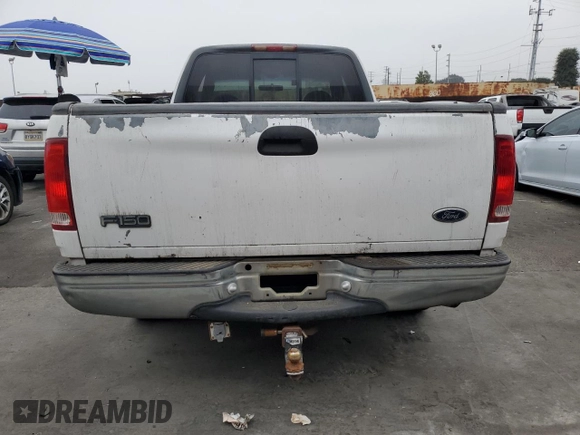 2000 Ford F-150 XL with VIN 1FTRX17L5YKA74815, listed as a Copart auction lot 85821444 with 0 mi miles and Salvage Title. Bid and sale history available at carsss.com. Image 6.