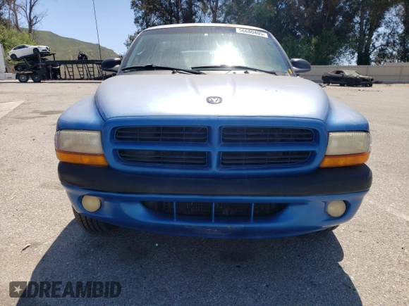 2000 Dodge Dakota z VIN 1B7FL26X5YS682973, wystawiony jako Copart lot #56680405 z przebiegiem 90 762 mil mil oraz Czysty tytuł • Clean title. Historia ofert i sprzedaży dostępna na DreamBid. Obrazek 5.