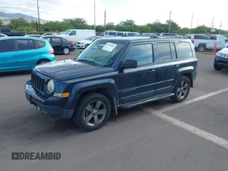 2014 Jeep Patriot Latitude with VIN 1C4NJPFA9ED679293, listed as a IAAI auction lot 42078681 with 94,124 mi miles and . Bid and sale history available at DreamBid. Image 2.