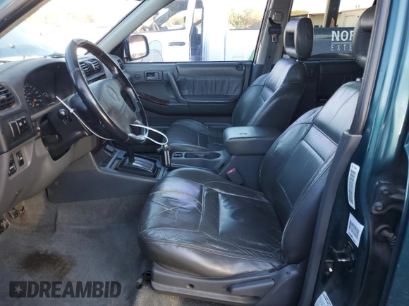 1999 Isuzu Rodeo S с VIN 4S2CK58W6X4352441, выставлен на аукционе Copart как лот 81915384 с пробегом 338 513 миль миль и На запчасти • Non repairable. История ставок и продаж доступна на DreamBid. Изображение 7.