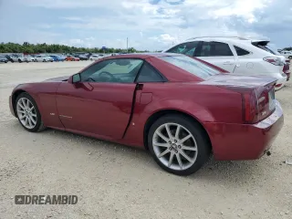 2006 Cadillac XLR z VIN 1G6YX36D165603774, wystawiony jako Copart lot #74369974 z przebiegiem Nie podano mil oraz Szkody całkowita. Historia ofert i sprzedaży dostępna na DreamBid. Obrazek 2.
