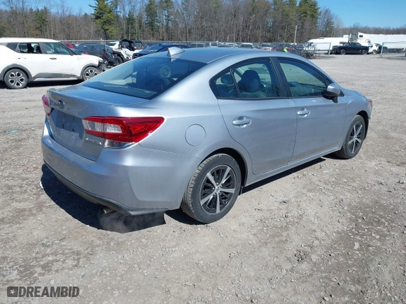 2019 Subaru Impreza Premium with VIN 4S3GKAC67K3605326, listed as a IAAI auction lot 41883752 with 52,891 mi miles. Bid and sale history available at carsss.com. Image 4.