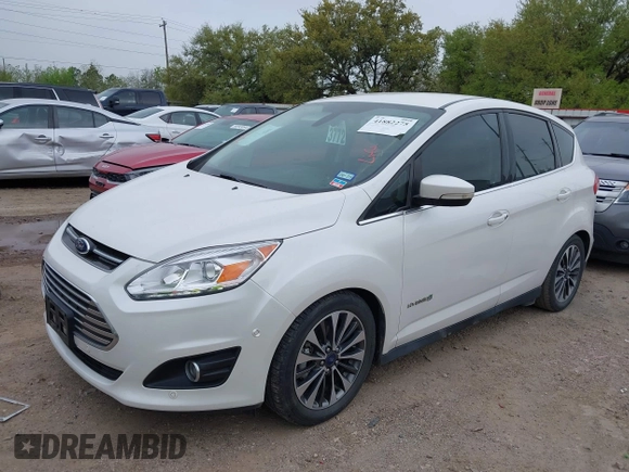 2018 Ford C-Max Titanium with VIN 1FADP5DUXJL104279, listed as a IAAI auction lot 41882275 with 55,137 mi miles and . Bid and sale history available at DreamBid. Image 2.