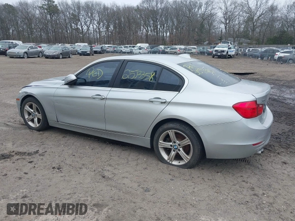 2015 BMW 3 Series 328i xDrive with VIN WBA3B5G57FNS12490, listed as a IAAI auction lot 41927689 with 999,999 mi miles. Bid and sale history available at carsss.com. Image 13.