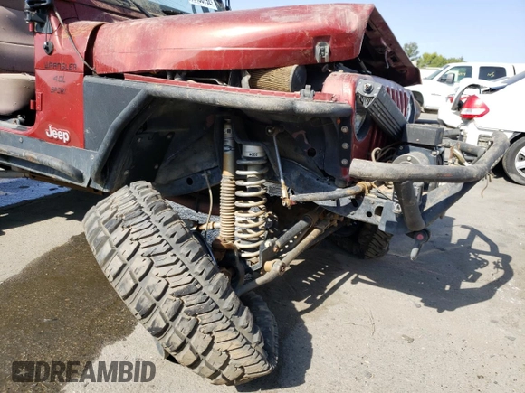 1999 Jeep Wrangler Sport with VIN 1J4FY19S5XP493117, listed as a Copart auction lot 57490792 with Not provided miles and Salvage title. Bid and sale history available at DreamBid. Image 9.