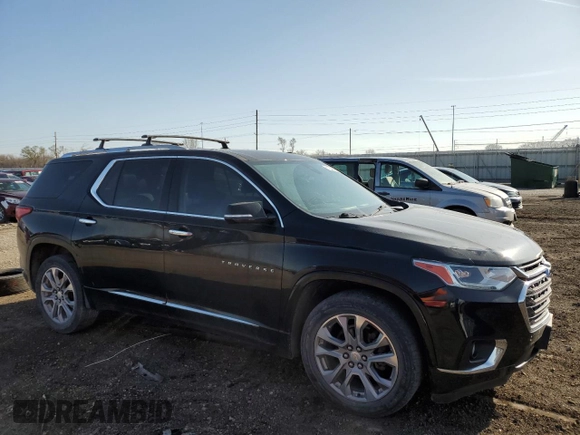 2018 Chevrolet Traverse Premier with VIN 1GNEVJKW5JJ152423, listed as a Copart auction lot 51202685 with 124,673 mi miles and Salvage Title. Bid and sale history available at DreamBid. Image 4.