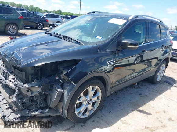 2015 Ford Escape Titanium with VIN 1FMCU0JX3FUB39808, listed as a IAAI auction lot 42212271 with 136,488 mi miles and . Bid and sale history available at DreamBid. Image 18.