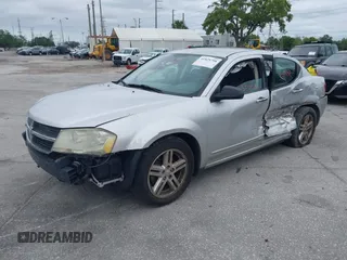 2008 Dodge Avenger SXT with VIN 1B3LC56K98N213958, listed as a IAAI auction lot 41829798 with 128,123 mi miles. Bid and sale history available at carsss.com. Image 2.