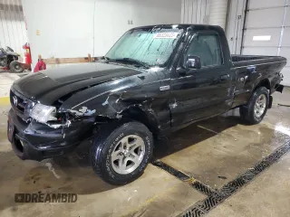 2002 Mazda B-Series 2WD Truck SX with VIN 4F4YR12D02TM00986, listed as a Copart auction lot 88323825 with 124,186 mi miles and Salvage Title. Bid and sale history available at carsss.com. Image 1.