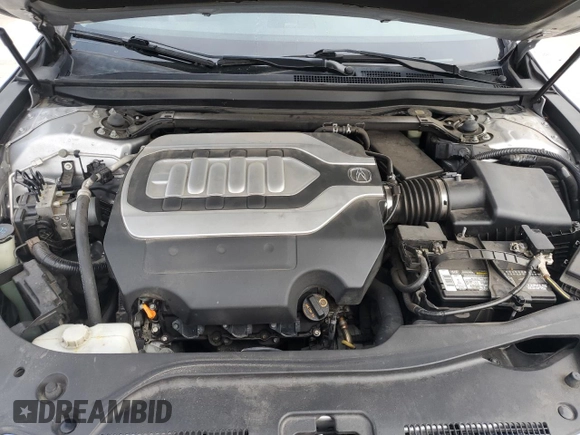 2015 Acura RLX Technology z VIN JH4KC1F59FC001663, wystawiony jako Copart lot #47754065 z przebiegiem 132 448 mil mil oraz Szkoda całkowita • Salvage title. Historia ofert i sprzedaży dostępna na DreamBid. Obrazek 13.