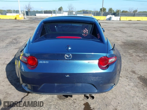 2020 Mazda MX-5 Miata Grand Touring z VIN JM1NDAM75L0412507, wystawiony jako IAAI lot #41573544 z przebiegiem Nie podano mil oraz . Historia ofert i sprzedaży dostępna na DreamBid. Obrazek 16.